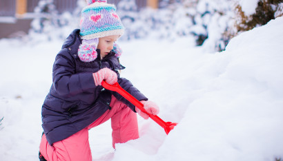 vecteezy little adorable girl play with snow shoveling on winter day 17706529